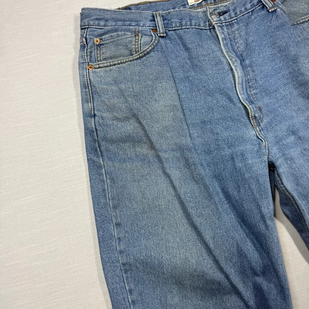 Levi's 560 Comfort Fit Jeans Mens 42x30 Blue Denim Light Wash Distressed Stained